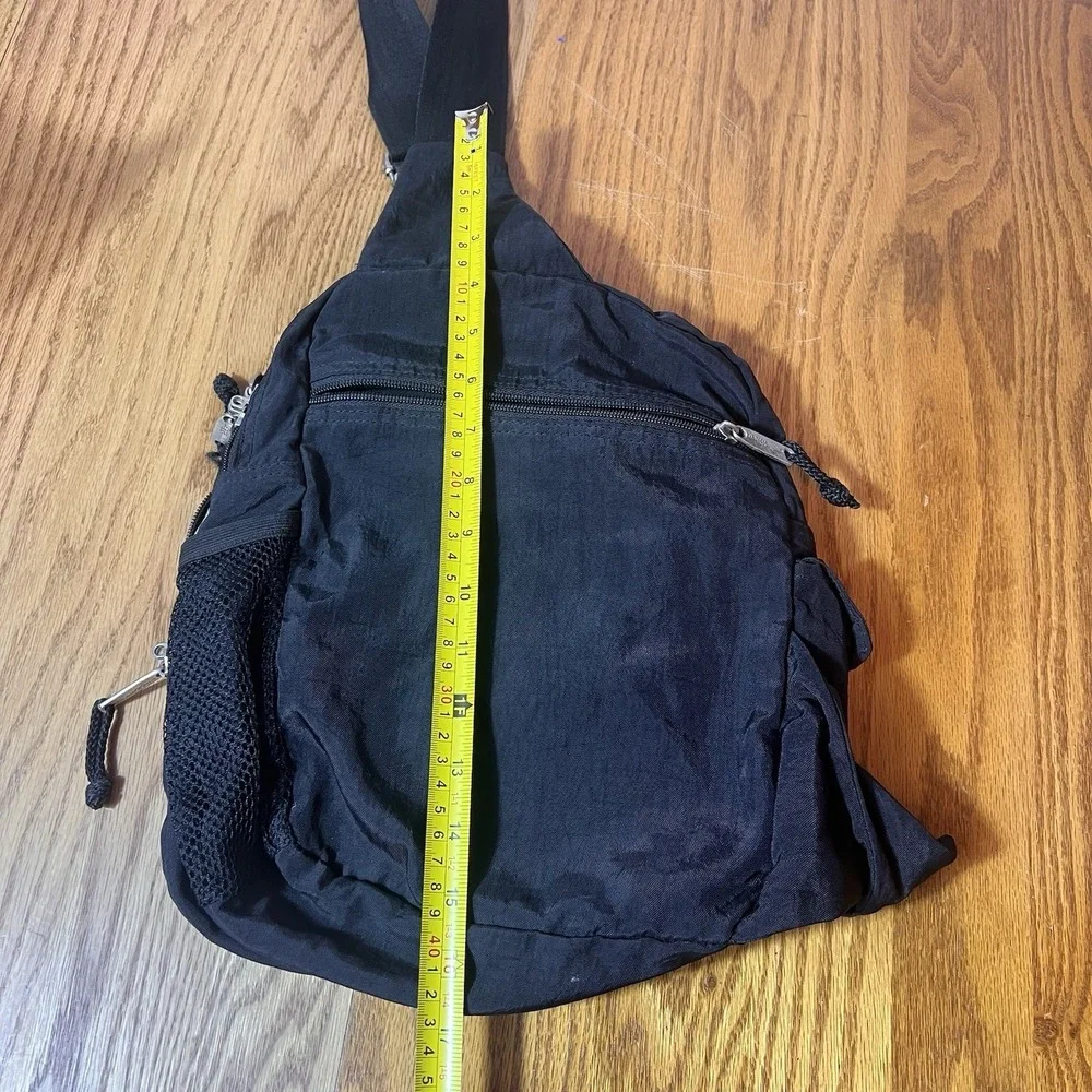 Baggallini Black Sling Bag Adjustable Crossbody Strap Zipper Accent Travel Purse